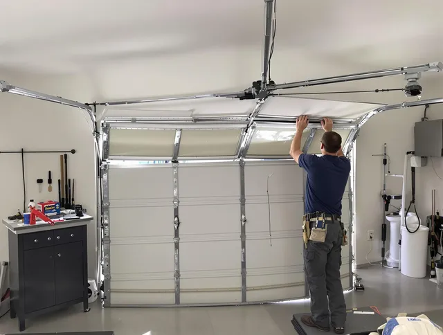Wilmington Island Garage Door Repair specialist performing precise section replacement on Wilmington Island garage door